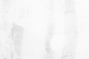 Unfinished White Painting with Big Stroke Brush on Concrete Wall Texture for Background.
