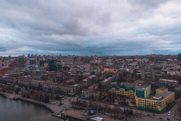 A bird's eye view of the dark blue sky over the city. Gloomy city