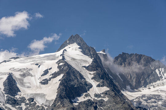 Snowy top of Grossglockner mountain summit in Austria summer afternoon