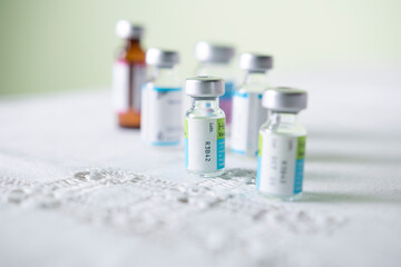 various and different glass containers containing medicine and vaccine