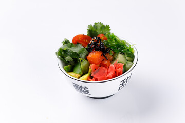 Hawaiian food platter, in a bowl on white background. Isolated. Pan-Asian cuisine to go or delivery in a container. Close-up
