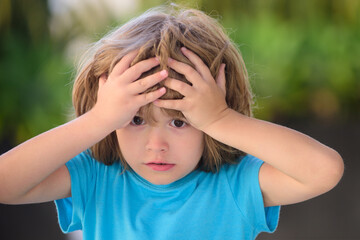 Kids emotions. Confused boy. Negative, nervous breakdown.