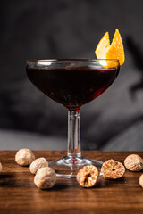 cocktail with nutmeg on the wooden table