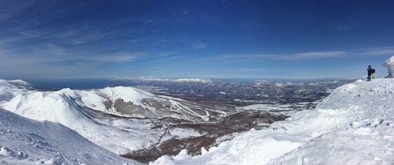 Panoramic view of mountain peak winter landscape Niseko Japan