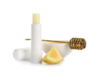 Natural lip balm with honey and lemon on white background