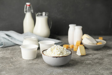 Different dairy products on gray background