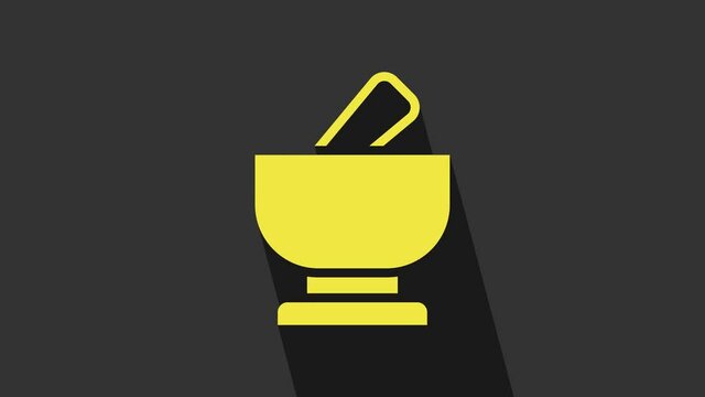 Yellow Mortar and pestle icon isolated on grey background. 4K Video motion graphic animation