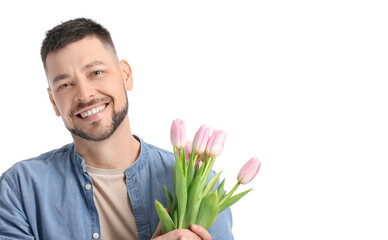 Handsome man with bouquet of beautiful flowers on white background