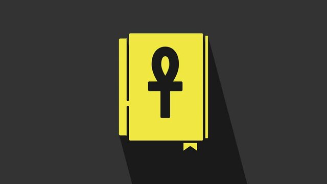 Yellow Cross ankh book icon isolated on grey background. 4K Video motion graphic animation