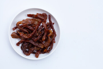 Deep fried sun-dried pork on white background.