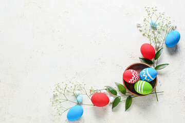 Composition with beautiful Easter eggs on light background