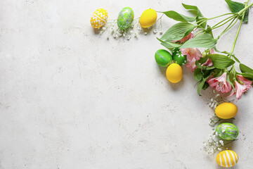 Composition with beautiful Easter eggs on light background