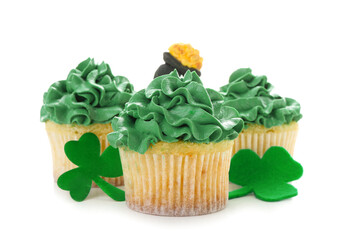 Tasty cupcakes for St. Patrick's Day on white background