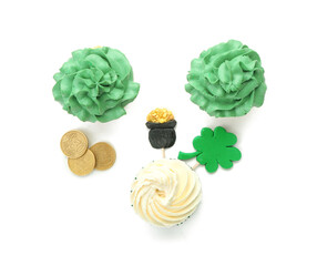 Tasty cupcakes for St. Patrick's Day on white background