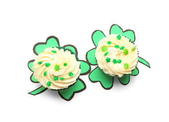 Tasty cupcakes for St. Patrick's Day on white background