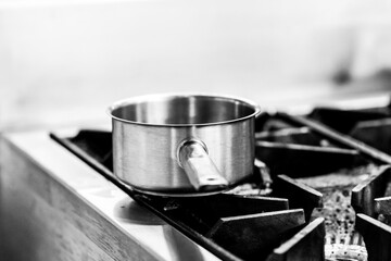 Chef cooking in a kitchen, chef at work, Black and White.