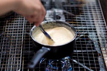 Chef cooking, Chef preparing food in the kitchen, Chef decorating dish, closeup.