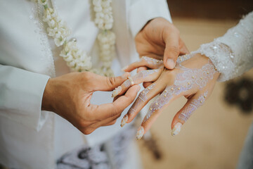 hands of bride and groom