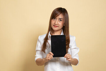 Young Asian woman with a computer tablet.