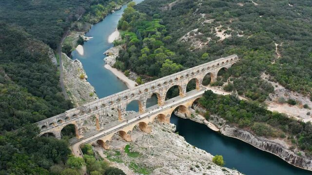 Flight over ancient Pont du Gard aqueduct in France