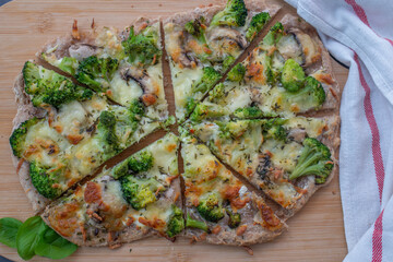 healthy green whole grain pizza with vegetables