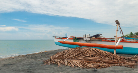 Obraz premium Fishing boat on the beach