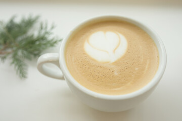 Big white cup of cappuccino coffee.