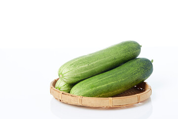 Fresh cucumber on white background