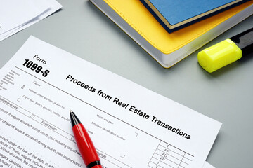  Financial concept about Form 1099-S Proceeds from Real Estate Transactions with sign on the page.