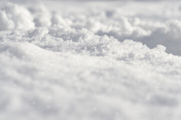Abstract snowy ground. Winter landscape with hills covered with snow. Fresh snow cover scenery....