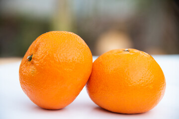 fresh orange fruit on blur background.