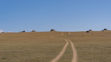 Fototapeta na wymiar Rocks Steppe Road Bulgan Mongolia