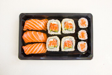 California sushi rolls set on the stone plate, sushi delivery set