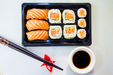 California sushi rolls set on the stone plate, sushi delivery set