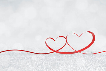couple red heart ribbon bow tie on glitter floor bokeh background concept design 