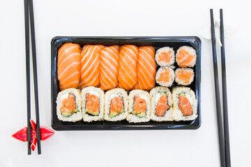 California sushi rolls set on the stone plate, sushi delivery set