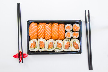 California sushi rolls set on the stone plate, sushi delivery set