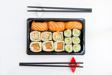 California sushi rolls set on the stone plate, sushi delivery set