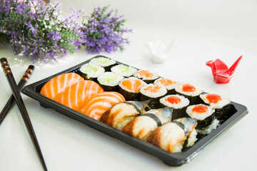 California an eel fish sushi rolls set on the stone plate, sushi delivery set