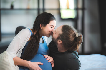 pregnant woman hug with her husband couple at home, family person pregnancy motherhood concept, love and Valentine's Day celebrating with family at home