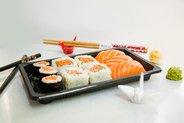 California sushi rolls set on the stone plate, sushi delivery set