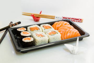 California sushi rolls set on the stone plate, sushi delivery set