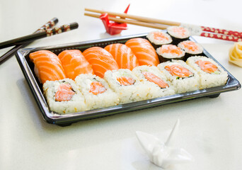 California sushi rolls set on the stone plate, sushi delivery set