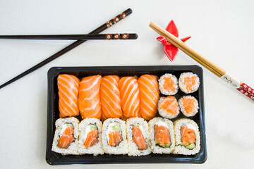 California sushi rolls set on the stone plate, sushi delivery set