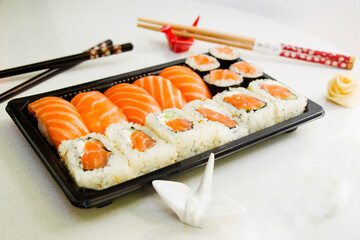 California sushi rolls set on the stone plate, sushi delivery set