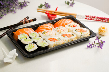 California sushi rolls set on the stone plate, sushi delivery set