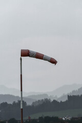 windsock indicating stormy winds on an airport