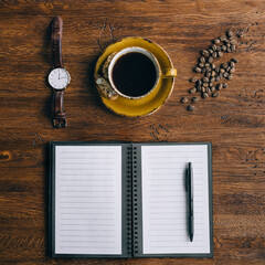 Table, coffee, glasses, notepad. Top view, flat lay