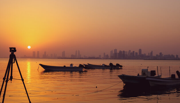 sunset on the river with boat