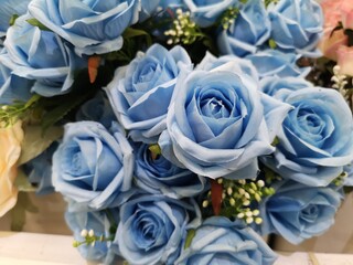 Soft blue color Rose handmade Artificial bouquet flowers decoration ornamental background vintage for greeting card celebration event design Retro, fabric and plastic, Valentine Day, love symbol